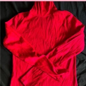 red turtle neck 
only worn once 
size L